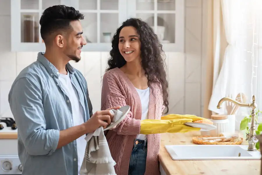 Couple Doing House Chores Together